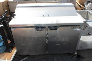 True TSSU-48-12 48 3/8" 2 Door Refrigerated Sandwich Prep Table. Tested In Working Order. S/N: 1156116