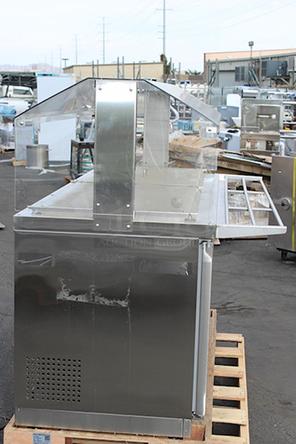 BRAND NEW SCRATCH & DENT! Avantco SS-CFT-72-HC 72" Stainless Steel Refrigerated Salad Bar / Cold Food Table with Sneeze Guard, Pan Cover, and Tray Slide. 115 Volts, 6.7 Amps, 1 Phase. S/N: 622063245 Minor Denting/Scuffing. IN WORKING ORDER. - Image 2 of 8