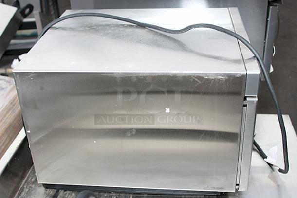 BRAND NEW SCRATCH & DENT! Amana HDC1815 Heavy-Duty Stainless Steel Commercial Microwave with Push Button Controls - 208/240V, 1800W, 14.4 Amps, 1 Phase, 60 Hz. S/N: 2410110964. Unit is dented on the sides. - Image 2 of 6