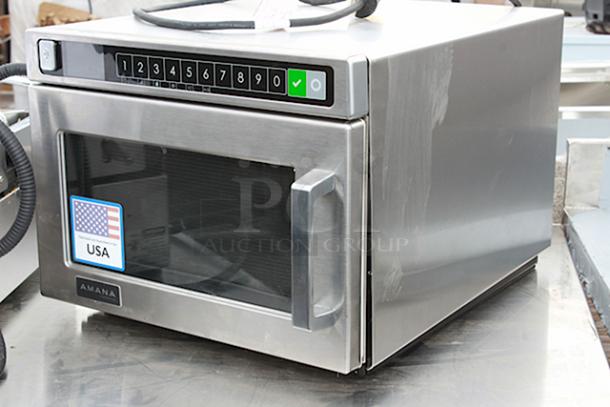 BRAND NEW SCRATCH & DENT! Amana HDC1815 Heavy-Duty Stainless Steel Commercial Microwave with Push Button Controls - 208/240V, 1800W, 14.4 Amps, 1 Phase, 60 Hz. S/N: 2410110964. Unit is dented on the sides. - Image 3 of 6