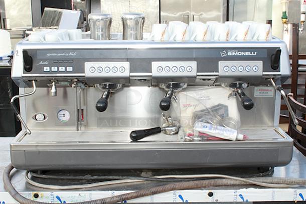 LIGHTLY USED! Nuova Simonelli Aurelia Group 3 Volumetric Espresso Machine, High Productivity & Consistency. Includes everything needed to operate and serve. In working order. - Image 1 of 11