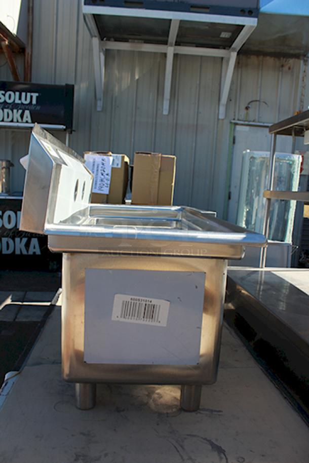 BRAND NEW SCRATCH & DENT! Regency 600S31014G 39" 16-Gauge Stainless Steel Three Compartment Commercial Sink with Galvanized Steel Legs and without Drainboards - 10" x 14" x 12" Bowls. Includes: Legs and Drain. Unit has minor bending to backsplash. - Image 6 of 7