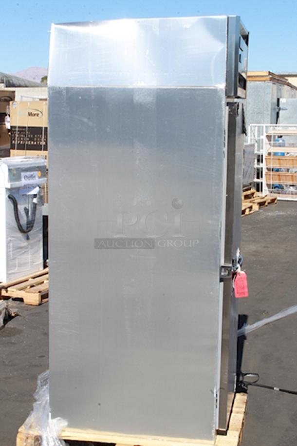 BRAND NEW SCRATCH & DENT! Continental Refrigerator 1R-N 26" Solid Door Reach-In Refrigerator, 115 Volts, 1 Phase, 60Hz. On Commercial Casters. In working Order. Keys to lock are missing. S/N: 16494690. Unit is dented. See photos. - Image 2 of 6