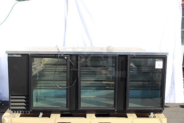 BRAND NEW SCRATCH & DENT! True TBB-4G-HC-LD 90 3/8" Black Glass Door Back Bar Refrigerator with LED Lighting. 115 Volts	2.8 Amps	1 Phase	60 Hz. Missing Keys. Power cord needs to be replaced. - Image 1 of 2