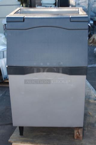 BRAND NEW SCRATCH AND DENT! Scotsman B530P Ice Storage Bin 536 lb. Plastic Exterior. One leg is missing and one is has a damaged footing (see photos).