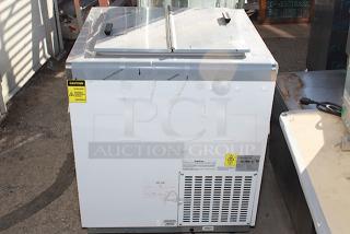 BRAND NEW SCRATCH & DENT! Excellence HFF-4HC 31" Flip Lid Ice Cream Dipping Cabinet. S/N: 2406104691. 115 Volts	3.3 Amps	1 Phase	60 Hz. Right Side is dented. See photos.
