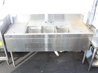 DEAL!! Glastender TSB-60-S Underbar Three Compartment Sink Unit With Drainboards, 60"x24". Sink Compartment Dimensions: 11" W X 14" Front-To-Back X 10-1/4" Deep, 12" Drainboards On Left & Right With Removable  Perforated Inserts & Deck Mount Faucet. STAINLESS STEEL CONSTRUCTION & STAINLESS STEEL LEGS!! S/N: 262843