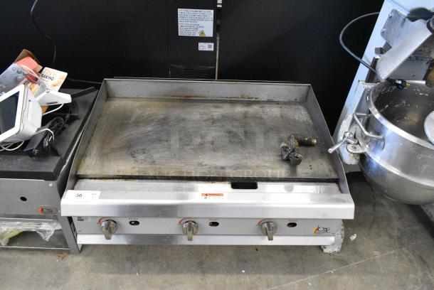 Cooking Performance Group CPG 351GMCPG36NL Stainless Steel Commercial Countertop Natural Gas Powered Flat Top Griddle. - Image 1 of 9