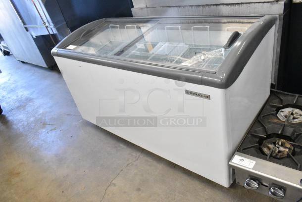BRAND NEW SCRATCH AND DENT! Beverage Air NC-60HC-1-W 60" Curved Lid Novelty Display Freezer on Commercial Casters. 120 Volts, 1 Phase. Tested and Working! - Image 2 of 9