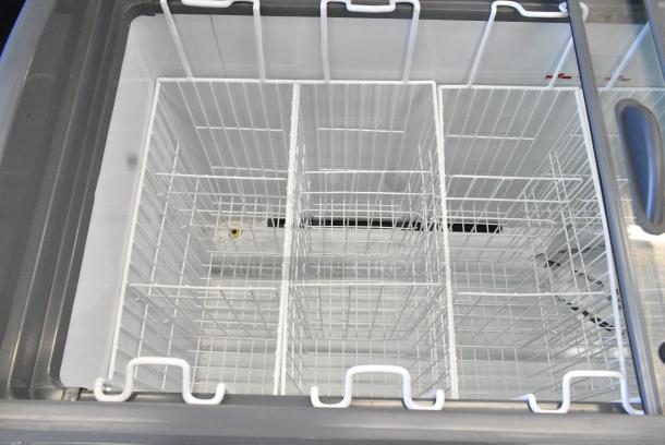 BRAND NEW SCRATCH AND DENT! Beverage Air NC-60HC-1-W 60" Curved Lid Novelty Display Freezer on Commercial Casters. 120 Volts, 1 Phase. Tested and Working! - Image 5 of 9