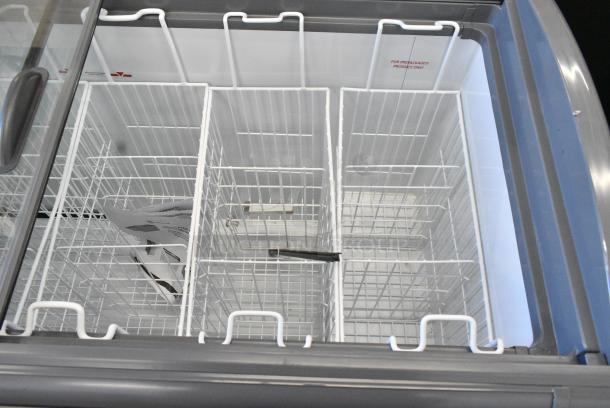 BRAND NEW SCRATCH AND DENT! Beverage Air NC-60HC-1-W 60" Curved Lid Novelty Display Freezer on Commercial Casters. 120 Volts, 1 Phase. Tested and Working! - Image 6 of 9