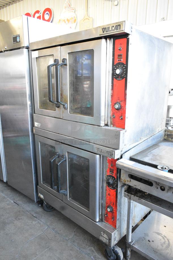 2 Vulcan Stainless Steel Commercial Natural Gas Powered Full Size Convection Oven w/ View Through Doors, and Thermostatic Controls on Commercial Casters. 2 Times Your Bid! - Image 1 of 9