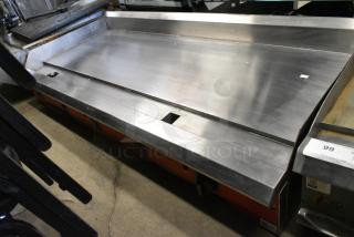 Avantco 177CAG60TG Chef Series Stainless Steel Commercial Countertop Natural Gas Powered Flat Top Griddle w/ Thermostatic Controls. 175,000 BTU.