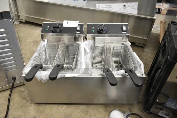 BRAND NEW SCRATCH AND DENT! 2024 Vollrath FFA8110 Stainless Steel Commercial Electric Powered 2 Bay Deep Fat Fryer w/ 4 Metal Fry Baskets. 208/240 Volts, 1 Phase. - Image 1 of 10
