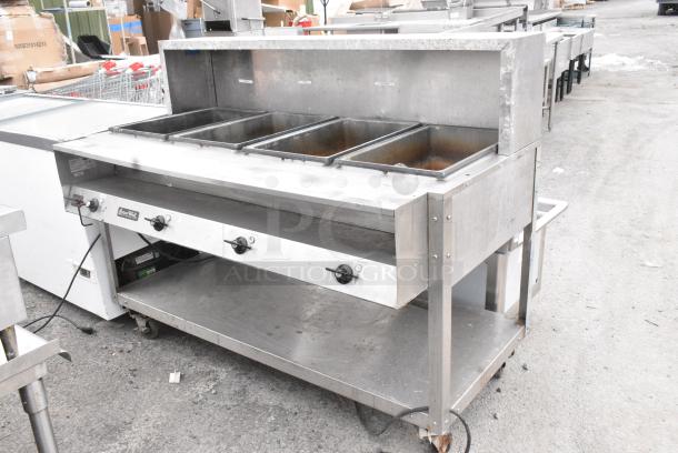 ServeWell 38004 Stainless Steel Electric Powered 4 Bay Steam Table w/ Under Shelf on Commercial Casters. 120 Volts, 1 Phase. - Image 1 of 9