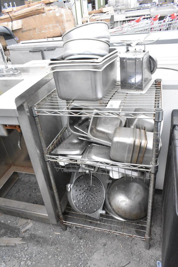 Chrome Finish 3 Tier Wire Shelving Unit w/ Contents Including Stainless Steel Drop In Bins. BUYER MUST DISMANTLE. PCI CANNOT DISMANTLE FOR SHIPPING. PLEASE CONSIDER FREIGHT CHARGES. - Image 1 of 5