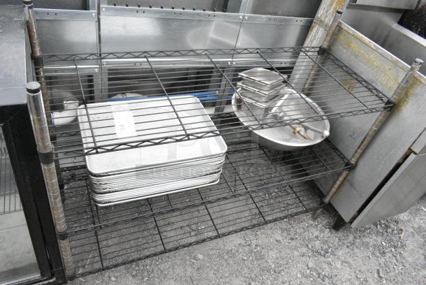 3 Tier Wire Shelving Unit w/ Contents Including Metal Baking Pans. BUYER MUST DISMANTLE. PCI CANNOT DISMANTLE FOR SHIPPING. PLEASE CONSIDER FREIGHT CHARGES. - Image 1 of 3