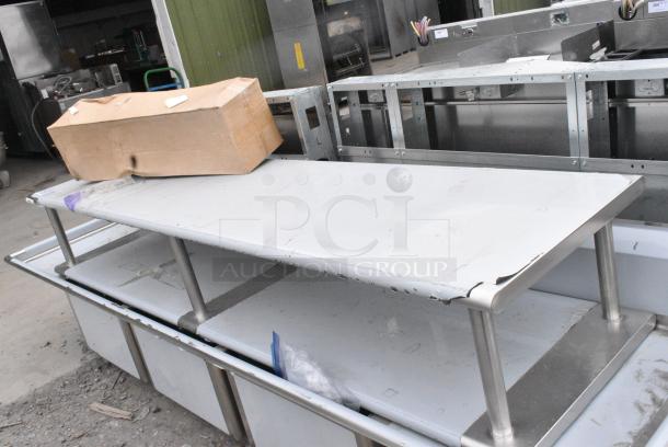 BRAND NEW SCRATCH AND DENT! Regency 600PTSD2496 24" Wide 16-Gauge Type 304 Stainless Steel Pass-Through Shelf with Overshelf - Image 2 of 6