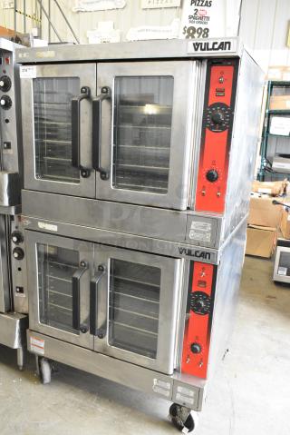 2 Vulcan VC4ED Stainless Steel Commercial Electric Powered Full Size Convection Oven w/ View Through Doors, Metal Oven Racks and Thermostatic Controls on Commercial Casters. 240/480 Volts, 3 Phase. 2 Times Your Bid!