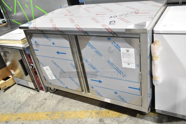 BRAND NEW SCRATCH AND DENT! Stainless Steel Counter w/ 2 Doors and Under Shelves on Commercial Casters. - Image 1 of 9