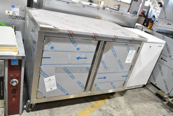 BRAND NEW SCRATCH AND DENT! Stainless Steel Counter w/ 2 Doors and Under Shelves on Commercial Casters. - Image 2 of 9