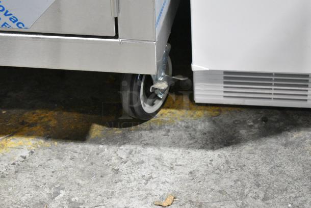 BRAND NEW SCRATCH AND DENT! Stainless Steel Counter w/ 2 Doors and Under Shelves on Commercial Casters. - Image 3 of 9