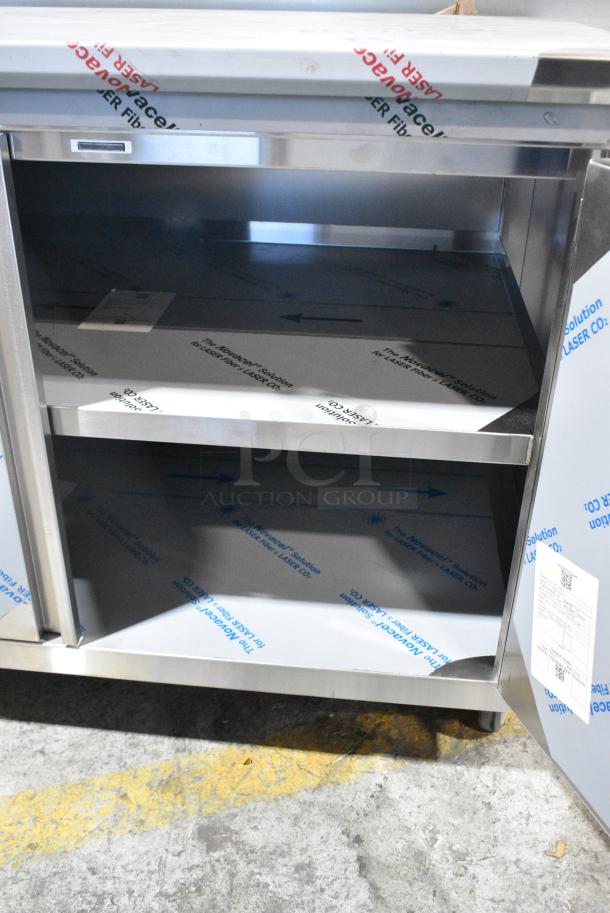 BRAND NEW SCRATCH AND DENT! Stainless Steel Counter w/ 2 Doors and Under Shelves on Commercial Casters. - Image 5 of 9