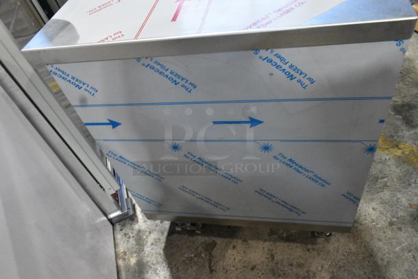 BRAND NEW SCRATCH AND DENT! Stainless Steel Counter w/ 2 Doors and Under Shelves on Commercial Casters. - Image 8 of 9