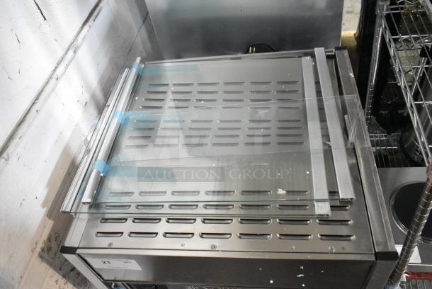 BRAND NEW SCRATCH AND DENT! ServIt 423PDW18D2 Stainless Steel 18" Self-Service Pizza Warmer with 4-Shelf Rotating Rack. 115 Volts, 1 Phase. Tested and Working! - Image 2 of 8
