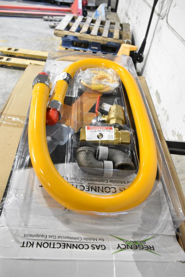BRAND NEW SCRATCH AND DENT! Regency 600GKM1060 60" Mobile Gas Connector Hose Kit with 2 Elbows, Full Port Valve, Restraining Device, and Quick Disconnect - 1" - Image 1 of 3