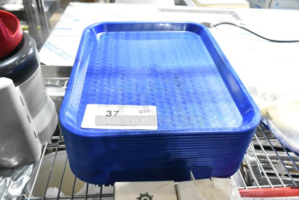22 BRAND NEW SCRATCH AND DENT! Carlisle CT101414 Cafe 10" x 14" Blue Standard Plastic Fast Food Tray. 22 Times Your Bid! - Image 1 of 4
