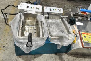 BRAND NEW SCRATCH AND DENT! 2024 Cooking Performance Group CPG 351EF302 Stainless Steel 30 lb. Dual Tank Heavy-Duty Electric Countertop Fryer w/ 2 Metal Fry Baskets. 208/240 Volts.