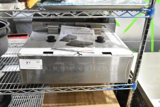 BRAND NEW SCRATCH AND DENT! Galaxy 177EF20E Stainless Steel 20 lb. Dual Tank Electric Countertop Fryer w/ 2 Metal Fry Baskets and 2 Lids. 110 Volts, 1 Phase.