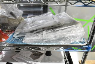 7 BRAND NEW SCRATCH AND DENT! Items Including BM176BUN18FULL PAN BUN 18"X26" FULL 18G ALUM WIRE IN RIM *920 NB* BAKER'S MARK, 4070250 Choice 2/3 Size Stainless Steel Slotted Steam Table / Hotel Pan Cover, Cooling Rack. 7 Times Your Bid!