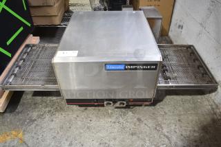 Lincoln Impinger 1302-4 Stainless Steel Commercial Countertop Electric Powered Conveyor Pizza Oven. 240 Volts, 1 Phase.