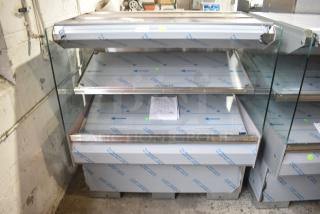 BRAND NEW SCRATCH AND DENT! 2016 BKI HSS4-2TSQ Stainless Steel Commercial Floor Style 2 Tier Warming Display Case Merchandiser. 230 Volts, 1 Phase.