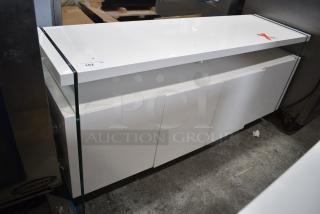 White Counter w/ 4 Doors.