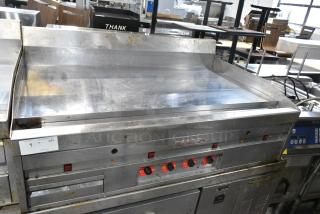 MagiKitch'n Stainless Steel Commercial Countertop Natural Gas Powered Chrome Top Flat Top Griddle w/ Thermostatic Controls.