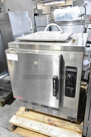 Hobart HC24EA5 Stainless Steel Commercial Countertop Electric Powered Single Deck Steam Cabinet. 208/240 Volts, 3/1 Phase.