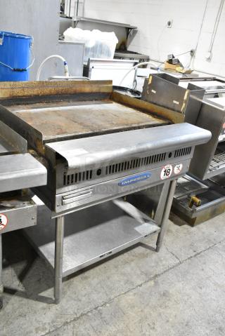 Imperial Stainless Steel Commercial Flat Top Griddle w/ Metal Under Shelf.