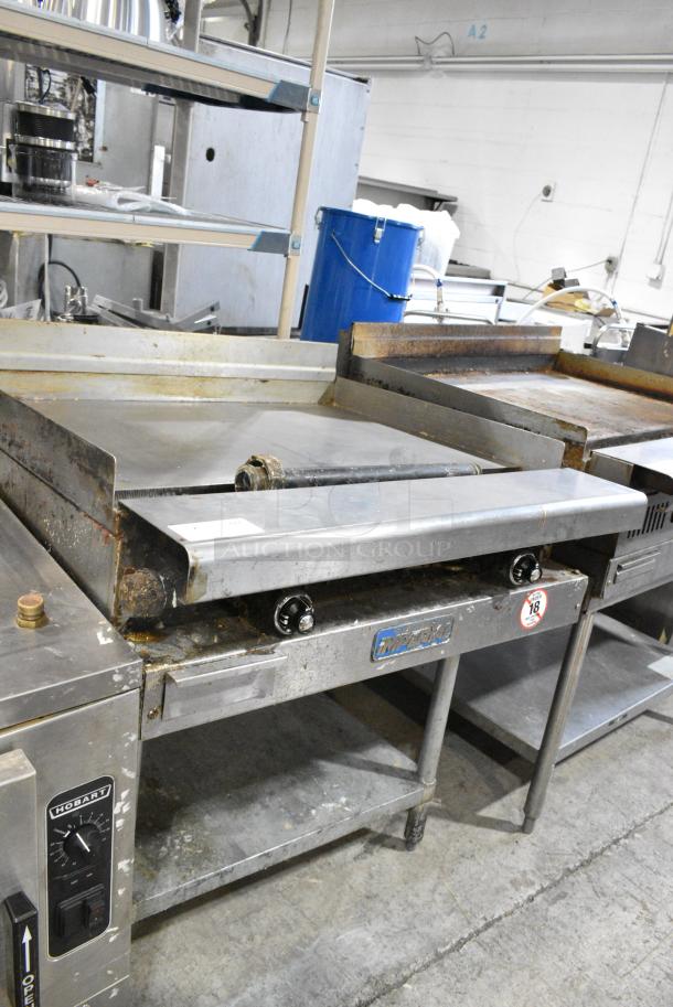 Imperial Stainless Steel Commercial Natural Gas Powered Flat Top Griddle w/ Metal Under Shelf. - Image 2 of 10