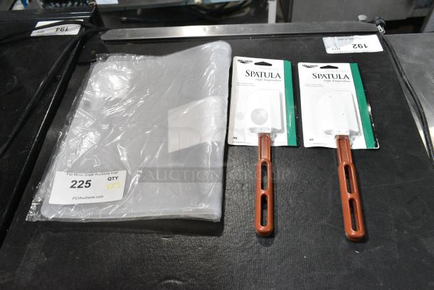 3 BRAND NEW SCRATCH AND DENT! Items Including 407FXLID1 Flexsil Lid Full Size High-Heat Silicone Steam Table / Hotel Pan Lid and 2 Vollrath Poly Spatulas. 3 Times Your Bid! - Image 2 of 7