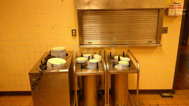 (1) STAINLESS HEATED MOBILE PLATE DISPENSER (2) MOBILE DISH DISPENSERS  
(1) LOCKING ROLL UP SHUTTER WINDOW 54"x 3 ' - Image 2 of 6