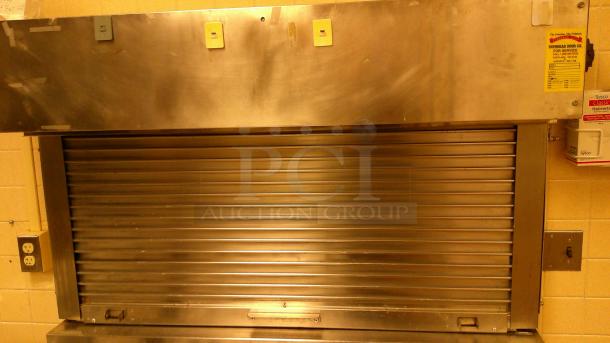 (1) STAINLESS HEATED MOBILE PLATE DISPENSER (2) MOBILE DISH DISPENSERS  
(1) LOCKING ROLL UP SHUTTER WINDOW 54"x 3 ' - Image 5 of 6
