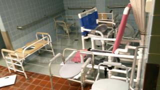 SHOWER ROOM! ASSORTED SHOWER BEDS AND CHAIRS