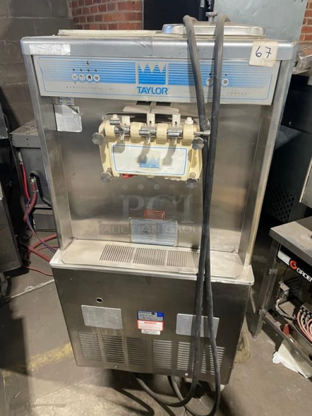 Taylor Commercial Stainless Steel Electric Powered Dual Flavor/Twist Soft Serve Ice Cream/Frozen Yogurt Machine! With 2 Hoppers & 3 Dispensers! With Drip Tray! Model: Y754-33 SN: J2076476! 208/230V 3 Phase! On Casters! - Image 1 of 7