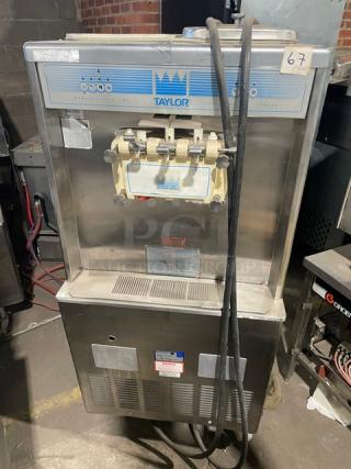 Taylor Commercial Stainless Steel Electric Powered Dual Flavor/Twist Soft Serve Ice Cream/Frozen Yogurt Machine! With 2 Hoppers & 3 Dispensers! With Drip Tray! Model: Y754-33 SN: J2076476! 208/230V 3 Phase! On Casters!