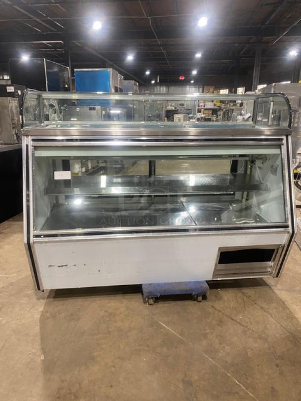Leader 7/11 Style Commercial Slanted Glass Refrigerated Deli Meat Display Case! With Curved Glass Top Display! With Rear Storage Compartment & Sliding Glass Doors! With Adjustable Stainless Steel Shelf! Model: SDL72 S/C SN: PV05S3114! 115V 1 Phase! - Image 1 of 8