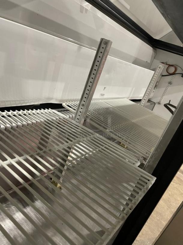 True Commercial Stainless Steel 3 Door Refrigerated Bain Marie Style Mega Top Salad/Sandwich Prep Table! With Poly Coated Wire Racks! Model: TSSU-72-18 SN: 1-4477571! 115V 1 Phase! On Casters! - Image 6 of 9