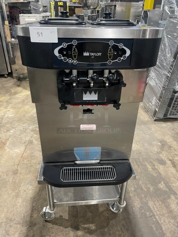Taylor Commercial Stainless Steel Electric Powered Dual Flavor/Twist Soft Serve Ice Cream/Frozen Yogurt Machine! With 2 Hoppers & 3 Dispensers! With Drip Tray! Model: C723-33 SN: M2018027! 208-230V 3 Phase! On Single Shelf Equipment Cart With Casters! - Image 1 of 9